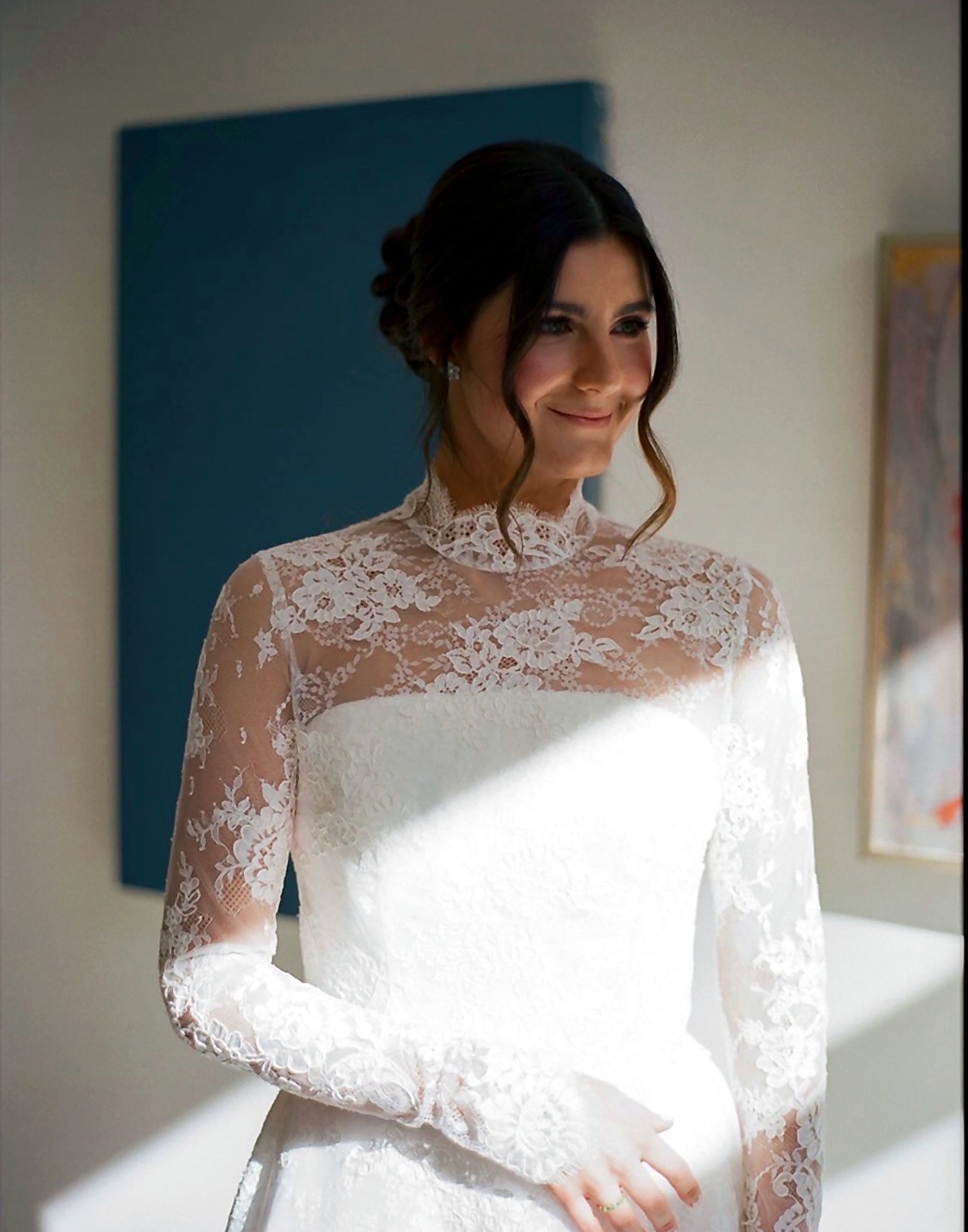 Soft-light bridal portrait in lace.